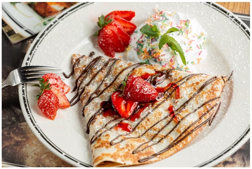 Sichuan Peppercorn Strawberry Crepes with Star Anise Balsamic Reduction