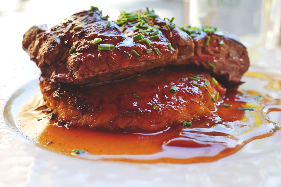 BBQ sauce tastes good with a steak.