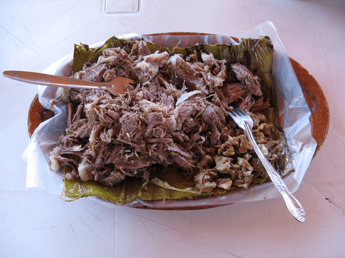 Meat prepared with the barbacoa technique.
