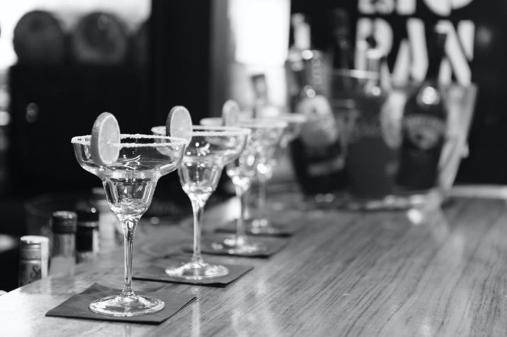 grayscale-photography-of-margarita-glass-on-table