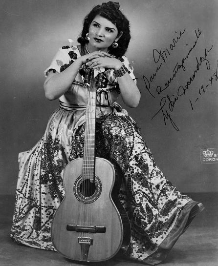 Lydia Mendoza with a guitar